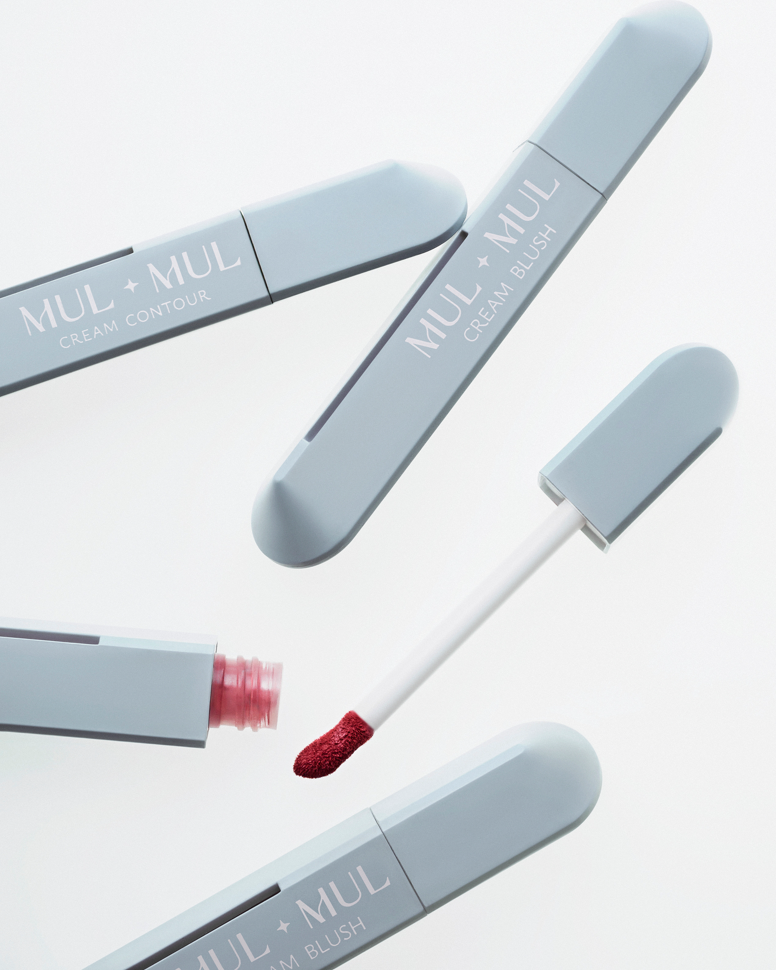 Makeup product retouching for cosmetic brands: MUL+MUL cream blush and contour sticks, packshot for campaigns